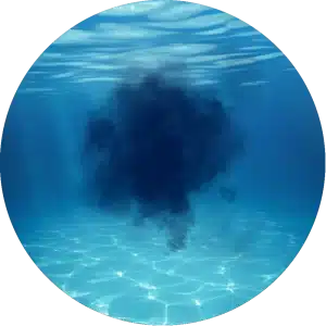 A circular picture of an ocean with a black substance, potentially indicating a pool leak.